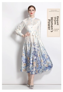 Detail of floral satin dress featuring a stand collar and elegant lantern sleeves