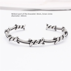 Close-up of vintage barbed wire cuff bracelet in silver steel with 8mm width detail