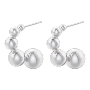 Detail of silver drop earrings featuring graduated polished metal beads in a C-shape design