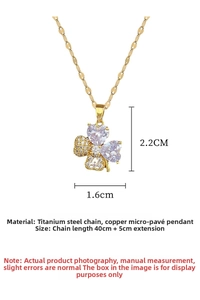 Detailed view of titanium steel four-leaf clover pendant with sparkling cubic zirconia