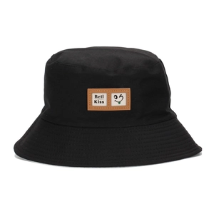 Unisex black bucket hat with a leather smiley face patch for sun protection and fashion