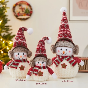 Three plush Christmas snowman dolls in red and white for holiday home and window decor