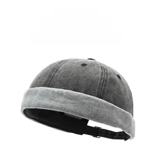 Detail view of washed cotton miki hat with adjustable back strap in charcoal grey