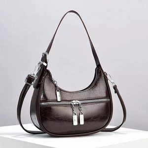 Minimalist deep wine red crescent shoulder bag with oil wax leather and silver zippers
