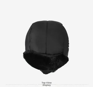 Top view of a black thermal trapper hat showing windproof fabric and thick plush lining