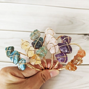 Handmade bohemian style open bangle with natural raw crystals and gold wire wrap