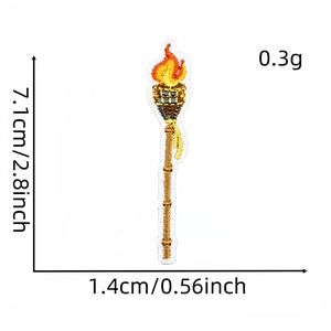 Detail view of embroidered torch patch with precise size measurements in cm and inches