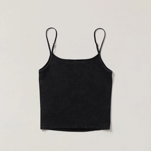 Detailed flat lay of black vintage cotton camisole with cross print and thin straps