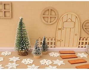 Miniature Christmas decor set with wooden door, window, and small sisal trees