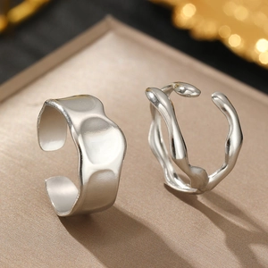 Irregular wave pattern stainless steel open ring set in polished silver finish