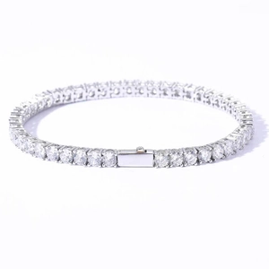 Detailed close-up of a silver tennis bracelet with round brilliant-cut moissanite stones