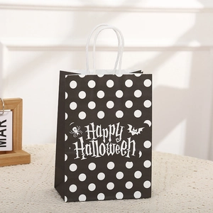 Bolsa de regalo de Halloween en papel kraft con puntos blancos y negros y asas de cuerda blanca