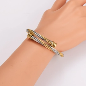 Exquisite two-tone twisted cable open cuff bracelet in gold and silver stainless steel