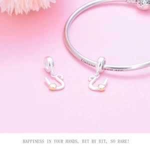 Detail of S925 silver bracelet with S letter charm and Unique you are engraving