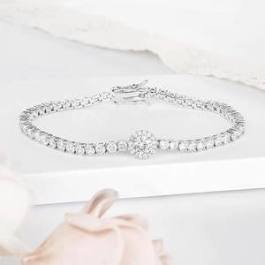 Elegant 6mm cubic zirconia tennis bracelet with central halo charm in silver finish