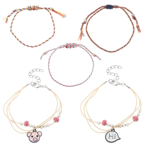Five-piece handmade bohemian layered bracelet set with heart charms and woven cords