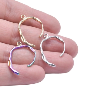 Irregular textured stainless steel charm pendants in gold, silver and rainbow finish