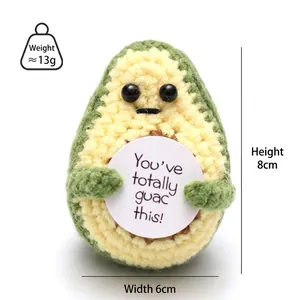 Handmade crochet avocado doll with motivational sign measuring 8cm in height and 6cm in width