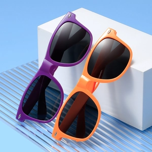 Retro purple and orange candy-colored oversized sunglasses with silver rivet accents
