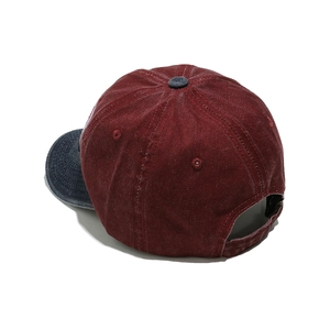 Rear view of vintage washed cotton baseball cap with adjustable strap and contrast stitching