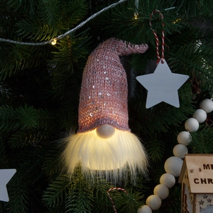 Lighted pink sequin gnome Christmas tree ornament with glowing white beard and knit hat