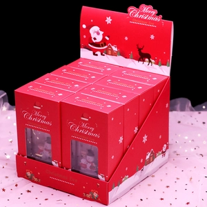 Set of eight Christmas gift boxes with transparent windows in a festive red display tray