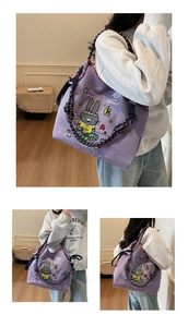 Detail of lavender canvas tote with cartoon rabbit print and woven rope shoulder straps