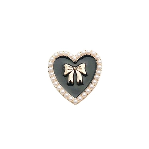 Retro black heart pendant with golden bow and white pearl trim for DIY phone case charm