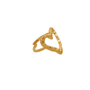 Detail of gold heart ring with irregular lava texture and adjustable open band design