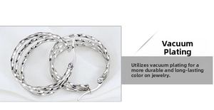Detail of silver twisted hoop earrings made of vacuum-plated stainless steel