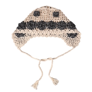 Handmade crochet floral bandana in beige and black with boho style tie-up straps