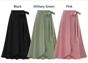 Detailed flat lay of high waist skirts in black, army green and pink colors with tie waist