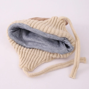 Winter knit bear earflap hat for kids featuring warm beige corduroy and soft inner lining