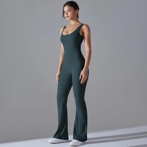 Detail of dark green flare leg yoga jumpsuit with U-neck and backless cutout design