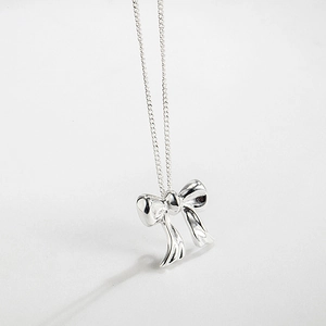 Polished silver bow pendant necklace for women with minimalist stainless steel link chain