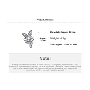 Detailed view of silver butterfly ring with micro-set cubic zirconia and copper base