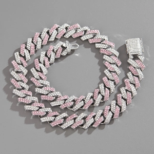 Macro shot of 15mm iced-out pink and silver Cuban link necklace with diamond box clasp