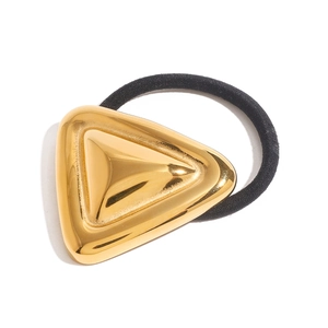 Minimalist golden triangle stainless steel hair tie with black elastic band on white background