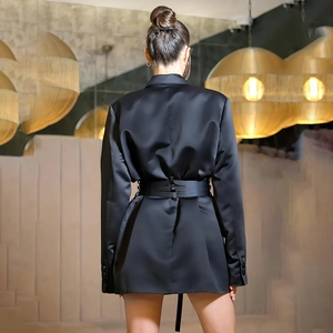 Back view of elegant black long-sleeve satin blazer with a waist belt for women