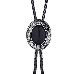 Western bolo tie with black oval gemstone and silver filigree metal on braided cord