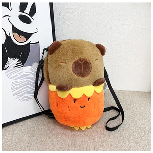 Close-up of a cute plush Capybara crossbody bag with strawberry details and soft texture