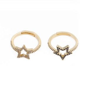 Adjustable gold plated star ring set featuring white zircon and black spinel pave