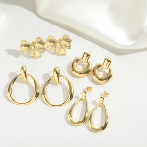 Golden earring set featuring hollow bow, thick hoop, oval, and teardrop drop designs