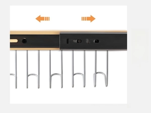Detail of silent damping slide rail with metal hooks for wall-mounted clothes rack
