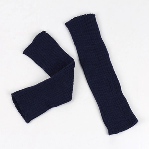 Detailed view of dark blue ribbed knit leg warmers with vertical striped texture pattern