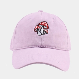 Close-up of high-quality red mushroom embroidery on light purple cotton baseball cap