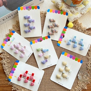 Cute heart-shaped plaid hair clips in colorful candy tones for girls and kids