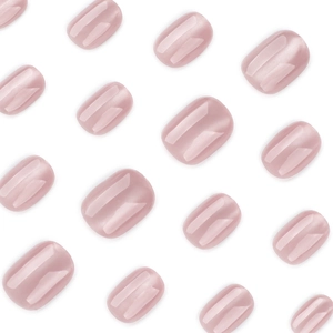 Short square nude cat-eye press-on nails with shimmering pearl finish on white background