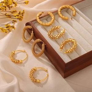Retro golden hoop earrings set with varied textured patterns in high quality titanium steel