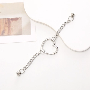 Detailed view of silver metal heart chain accessory for phone cases or bag charms